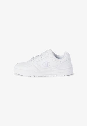 White low-top sneaker with lace-up closure, perforated details, and Champion logo on side and heel, against a white background.