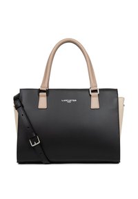 Sac à main noir et beige en matériau synthétique lisse, doté de deux poignées, d'une bandoulière amovible et d'un logo métallique simple.