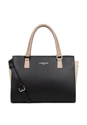 Sac à main noir et beige en matériau synthétique lisse, doté de deux poignées, d'une bandoulière amovible et d'un logo métallique simple.