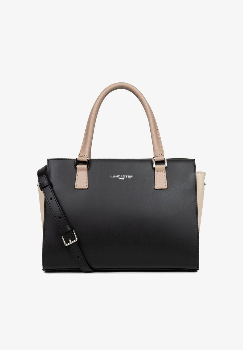 Sac à main noir et beige en matériau synthétique lisse, doté de deux poignées, d'une bandoulière amovible et d'un logo métallique simple.