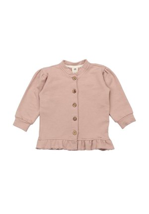 Light pink cotton jacket with long sleeves, button front, and a ruffled hem. Features puffed sleeves and wooden buttons.