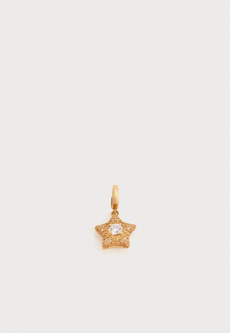 Pendentif doré en forme d'étoile avec une pierre précieuse centrale claire et de petits détails texturés, attaché à une petite boucle dorée.