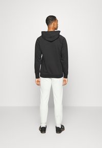 ASICS BIG LOGO SWEAT PANT - Calças de fato de treino - mid grey heather/dark grey