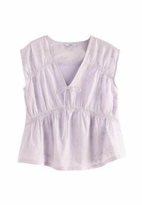 Blouse sans manches lavande clair avec un col en V, taille froncée, broderie florale et un détail à nouer à l'avant. Tissu doux et texturé.