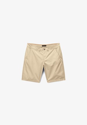 Beige casual men's shorts with belt loops, front button closure, zip fly, and side pockets laid flat on white background.