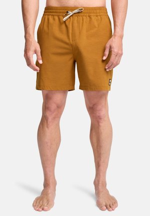 Heren zwemshorts in mosterdgeel, met een elastische tailleband met trekkoord, zijzakken en een klein merklabel op de zoom.