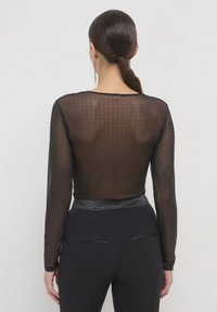 Calliope EN À STRASS - Camicetta - noir