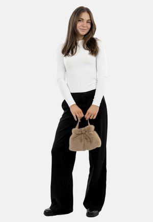 Faux fur handbag in light brown with a gathered design and short handles, paired with a white long-sleeve top and black wide-leg pants.