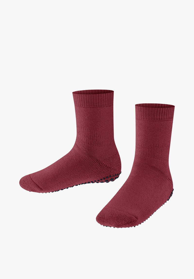 Rote Knöchelsocken aus einem strukturierten Strickmaterial mit einem gerippten Bündchen und einem gepunkteten Grip-Muster auf der Sohle für besseren Halt.