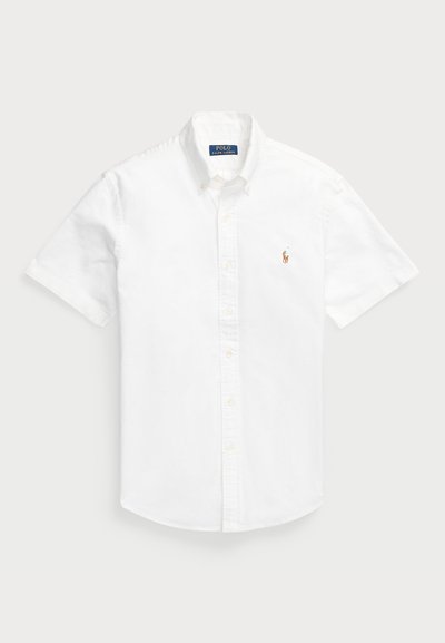 White short-sleeve button-up shirt made of cotton with a pointed collar, featuring a small embroidered logo on the left chest.