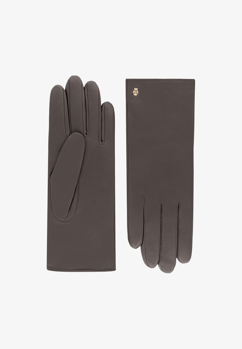 Brown leather gloves with fingers, featuring a smooth texture, stitched seams, and a small gold logo accent on one wrist area.