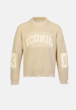 Sweater de malha bege com textura canelada, apresenta o gráfico "ICÓNICO" em branco. Bainhas desgastadas e os números "03" e "00" nas mangas.