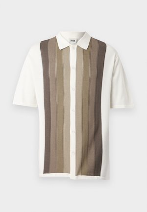 Short-sleeve collared shirt with vertical stripes in beige, brown, and cream; button closure; knit fabric with textured pattern.