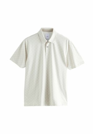 Lühikeste varrukatega polo särk heledas beezis, geomeetrilise mustriga, nööpide rida ja klassikaline krae. Pehme kangas, millel on peene struktuur.