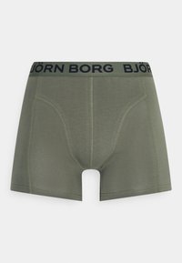 Πράσινα μποξεράκια με εφαρμοστό σχέδιο, διαθέτοντας μαύρη μέση με το λογότυπο "BJÖRN BORG" και διπλή ραφή για αυξημένη αντοχή.
