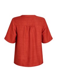 Top rosso a maniche corte con vestibilità rilassata, caratterizzato da una piega sul retro, una texture morbida e un semplice collo rotondo.