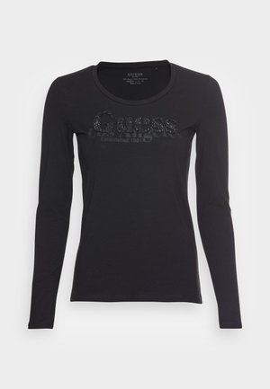 Czarna koszulka z długim rękawem i okrągłym dekoltem, z błyszczącym logo "Guess" i napisem "Established 1981" na piersi.