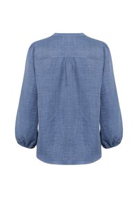 Blusa in chambray blu con maniche lunghe a palloncino, scollatura rotonda e design posteriore plissettato; tessuto leggero con finitura testurizzata.