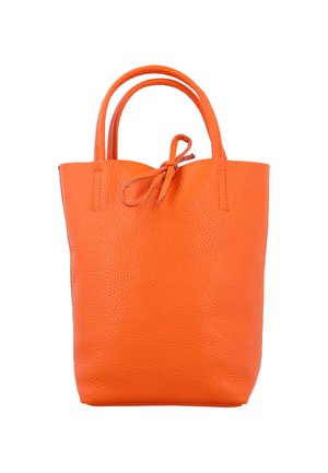Orange leather tote bag with a textured finish. Features two handles and a tied closure at the top. Simple, cylindrical shape.