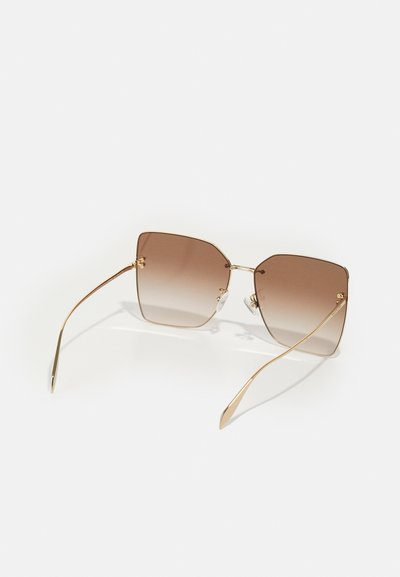 Alexander McQueen Slnečné okuliare - gold/brown