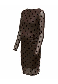 Brun, gjennomsiktig langermet kjole for gravide med svarte polkadotter og rynkede sider, designet for å passe en gravid kropp.