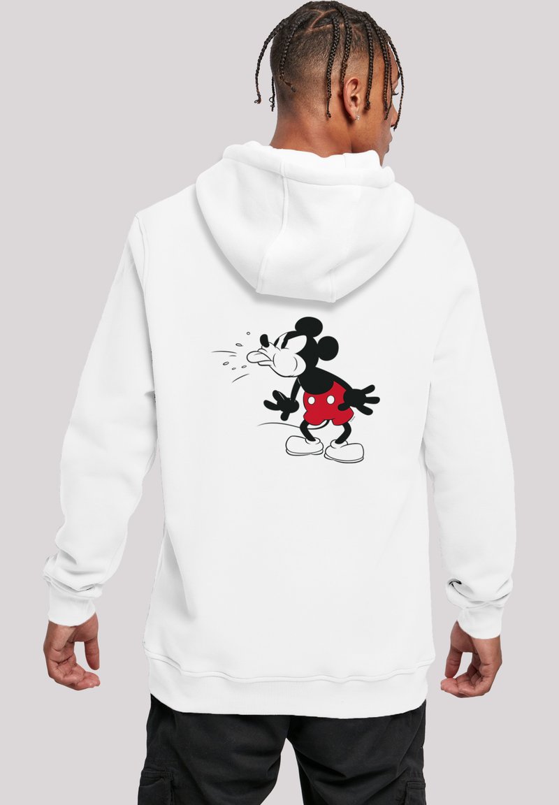 Hvit hettegenser med hette, med et stort svart og rødt trykk av Mickey Mouse på ryggen, med en løs passform og ribbestrikkede mansjetter.