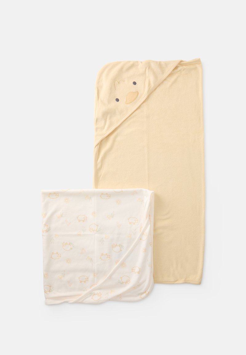 Divas mazulis segas: dzeltena kapuce sega ar cāļa seju un krēms sega ar pasteļtoņu lauku dzīvnieku rakstiem. Abas ir mīkstās auduma segas.