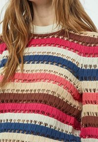 Knit sweater featuring horizontal stripes in pink, blue, brown, and cream, with an open, textured design and a ribbed neckline.