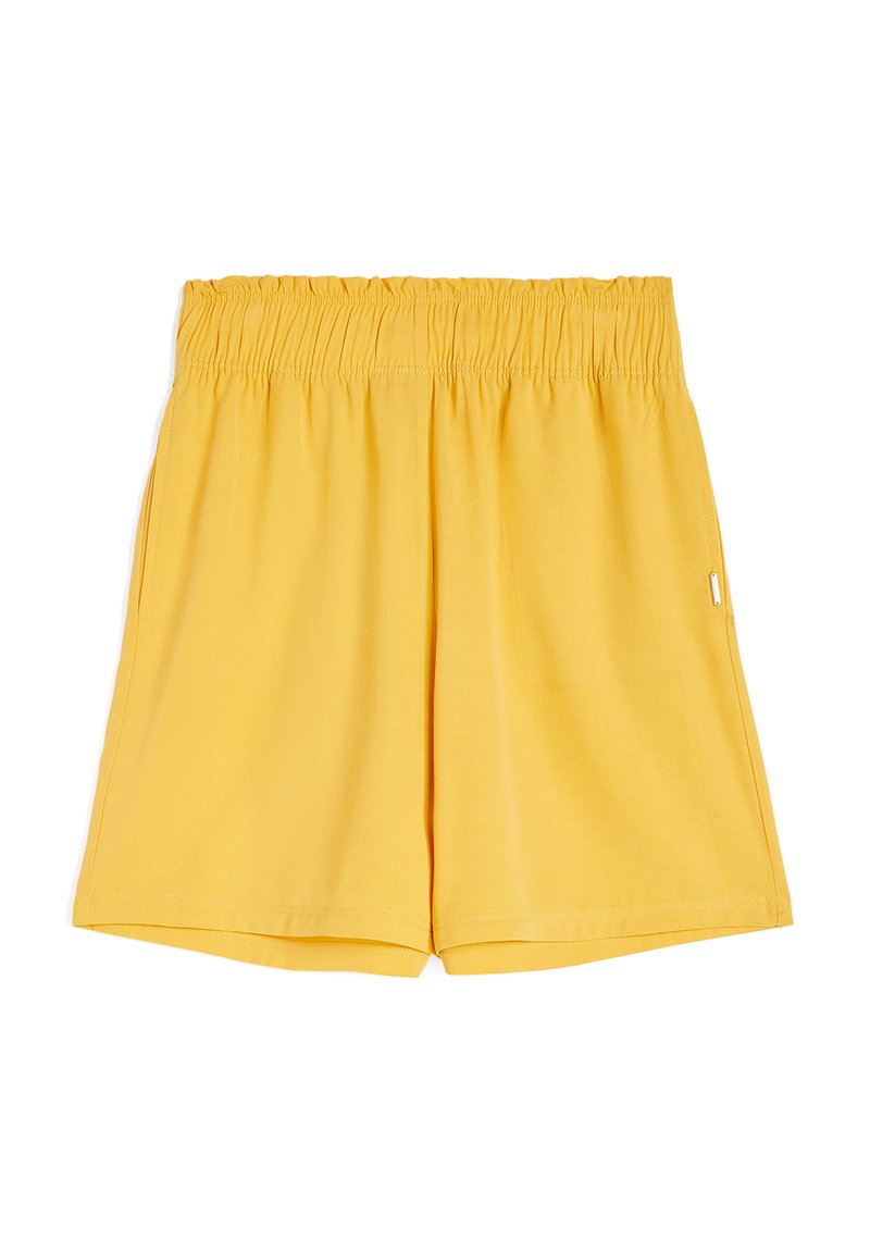 Pantaloni corti gialli realizzati in un tessuto morbido con vita elastica. Presentano una vestibilità rilassata e tasche laterali, con un piccolo etichetta logo sul lato.