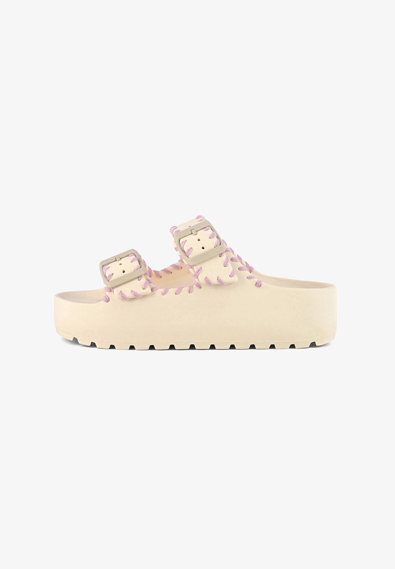 Sandali con piattaforma color tan, dotati di due cinturini regolabili, con cuciture rosa lungo i bordi e una suola texture per una buona presa.