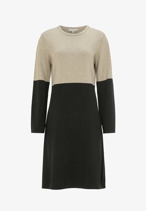 Langärmliges Kleid mit rundem Ausschnitt, bestehend aus einem beigen Oberteil und einem schwarzen Unterteil, gefertigt aus einem weichen, strukturierten Stoff.
