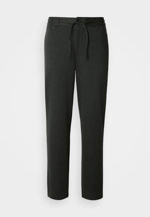 Pantalones de chándal gris oscuro hechos de una suave mezcla de algodón. Presentan una cinturilla elástica con cordón y bolsillos laterales. Diseño de pierna recta.