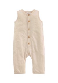 Beige mouwloze jumpsuit met vijf houten knopen aan de voorkant, gemaakt van een zachte, gestructureerde katoenstof; heeft korte benen en een ronde halslijn.
