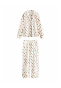 White pajama set with orange floral patterns. Includes button-up long-sleeve top and matching elastic waist pants. Cotton material.