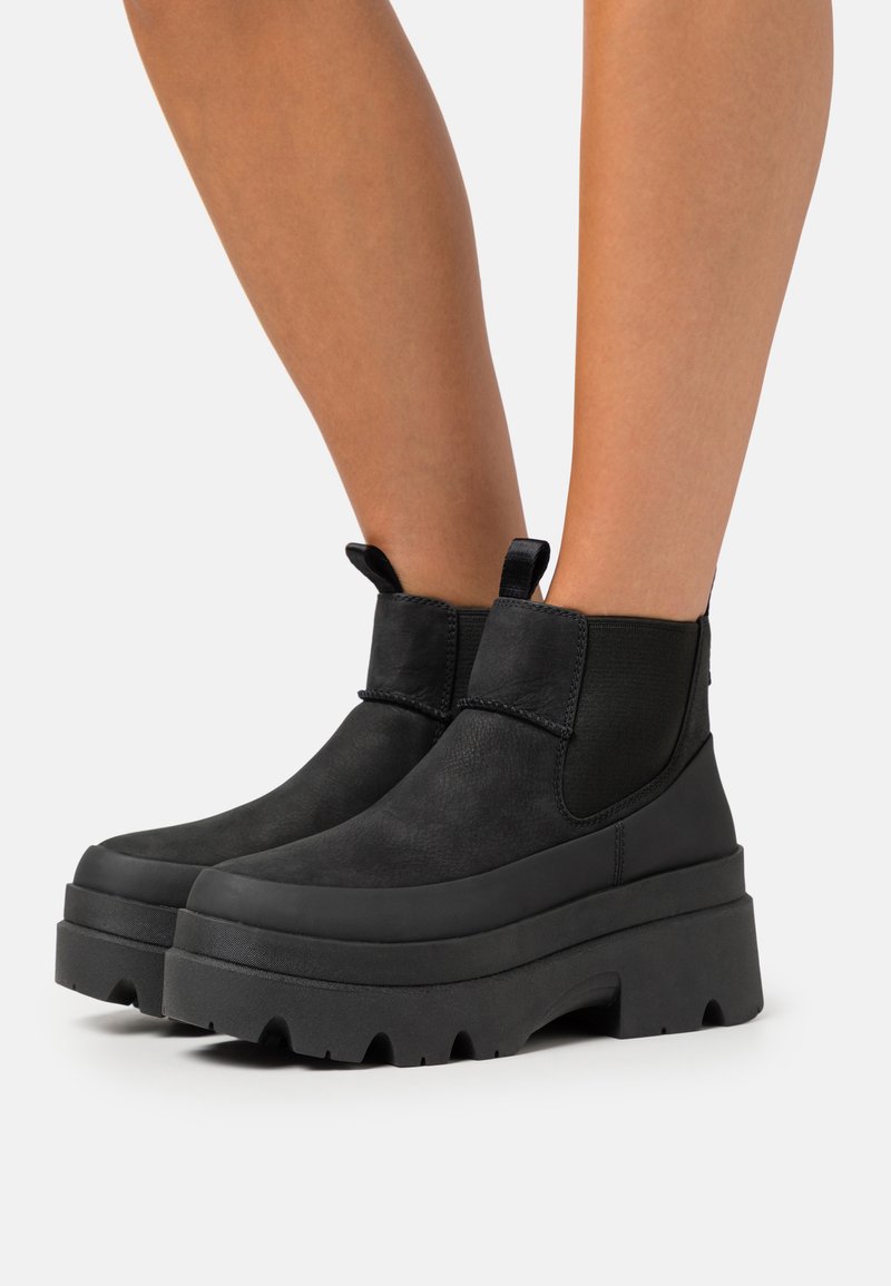 UGG BRISBANE CHELSEA - Platform ankle boots - black - Zalando.ie