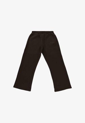 Pantalons de survêtement larges noirs avec ceinture élastique et texte discret "Dropsite" sur la cuisse gauche, posés à plat sur un fond blanc.