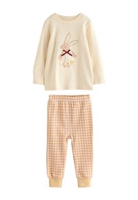 Langærmet cremefarvet top med brun kaningrafik, kombineret med gule og hvide gingham pyjamasbukser med elastisk talje, blødt bomuldsmateriale.