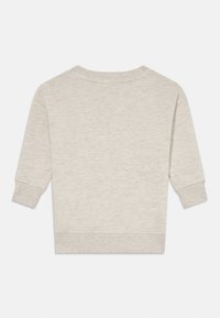 Felpa grigia chiara con maniche lunghe, polsini e orlo a coste. Tessuto morbido e testurizzato con un design semplice e privo di decorazioni.