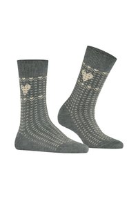 Dunkelgrüne Socken mit Muster und cremefarbenen Akzenten. Zu den Merkmalen gehören ein Herzdesign, Zickzackstreifen und gerippte Bündchen. Hergestellt aus strukturiertem Stoff.