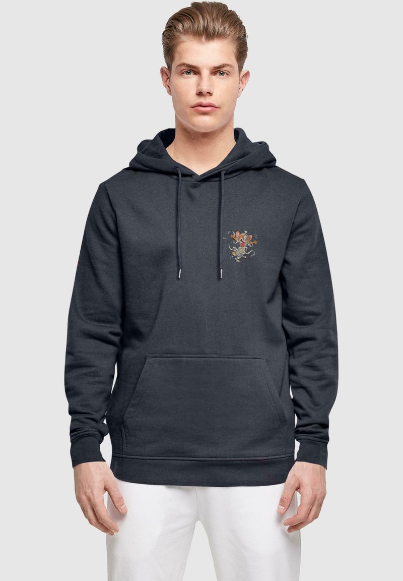 Mörkgrå hoodie i bomull med en framficka och dragsko huva. Dekorerad med en färgglad blommig grafik på bröstet.