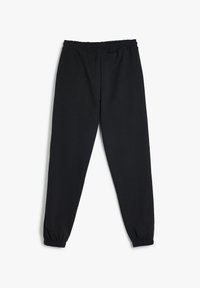 Sorte joggerbukser lavet af blødt stof, med elastisk talje og elastiske manchetter ved anklerne. Enkel design, uden synlige mønstre.