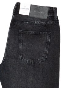 Jeans in denim nero di ONLY & SONS con una texture liscia. Presentano una tasca posteriore e un'etichetta in pelle con il nome del marchio sulla cintura.