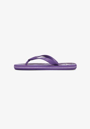 Tongs violettes avec une semelle texturée, des brides en caoutchouc et une semelle lisse. Caractéristiques d'une bande blanche le long du bord.