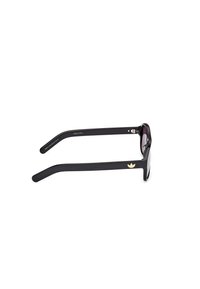 Black sunglasses with a sleek rectangular frame, textured arms, and a gold logo accent on the side. Lenses are dark and slightly reflective.