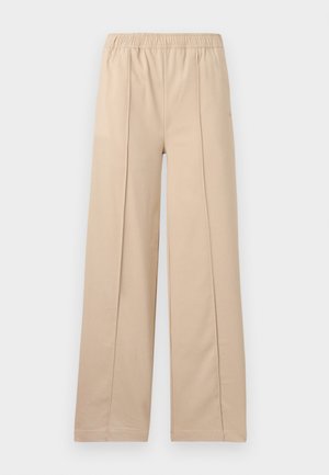 Pantaloni largi bej cu un tiv elastic, având două linii de pliu verticale, material moale și un design simplu.