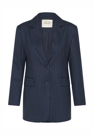 Tumši zilas svītrainas žaketes ar rūpīgi izšūtu atloku, divām pogām un divām priekšējām kabatām. Gluda auduma un piegriezuma precizitāte akcentē strukturēto dizainu.