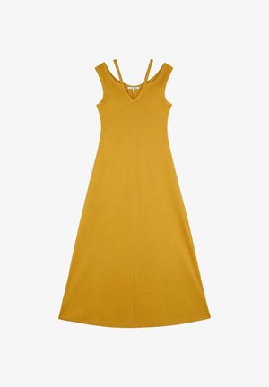 Keltainen, hihaton maksimekko, jossa on V-pääntie, neulottu kangas ja kaksi ohutta olkainta. Lattiaan ulottuva, tiiviisti istuva yläosa ja levenevä hame.