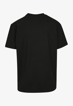 Czarna koszulka z okrągłym dekoltem, krótki rękaw i prosty dół. Wykonana z miękkiej bawełny, charakteryzuje się prostym, jednolitym wzorem.