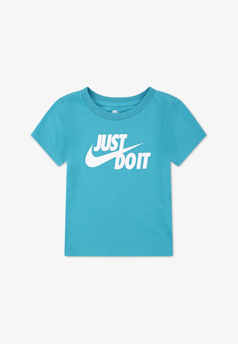 Light blue short-sleeve t-shirt made of cotton, featuring a large white "JUST DO IT" graphic with a Nike swoosh emblem.