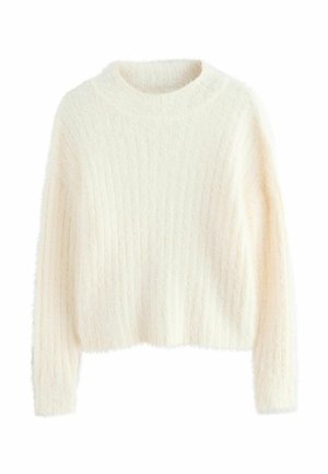 Maglione fluffy color crema con texture a coste, scollatura rotonda e maniche lunghe. Il design corto aggiunge un aspetto contemporaneo.